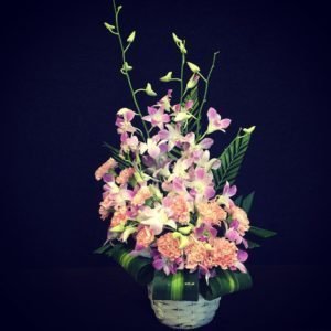 Orchids carnations flower arrangement